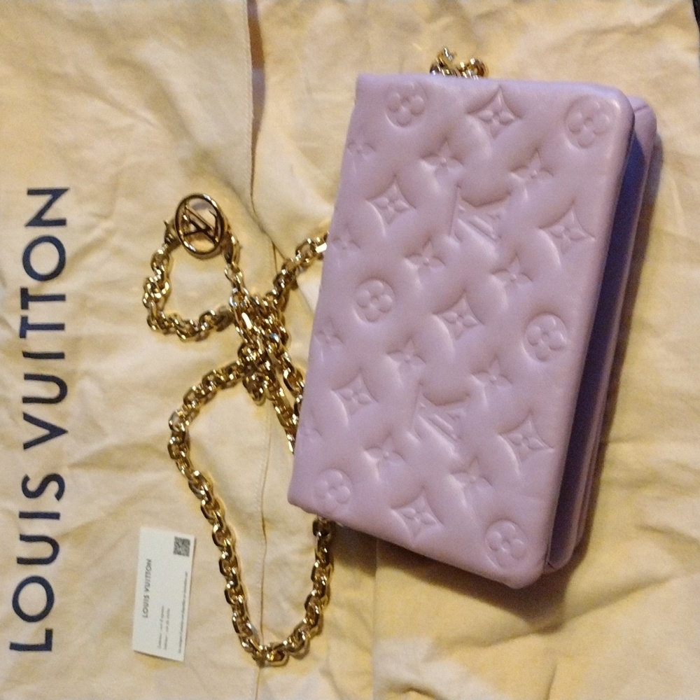 Louis Vuitton Cousin flap leather crossbody bag